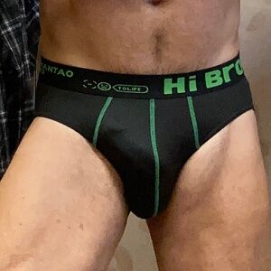 Black, medium brief with green writing.